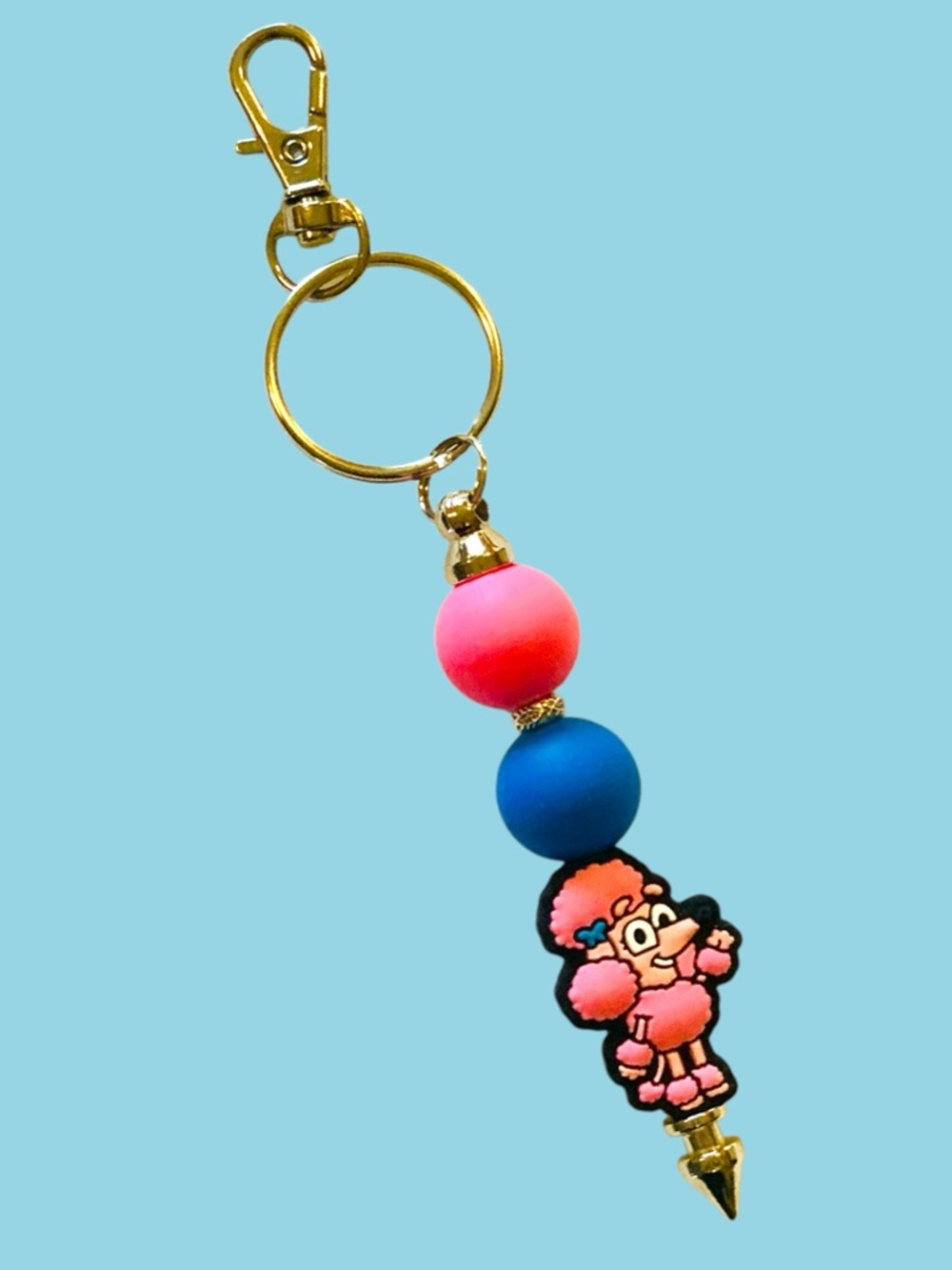 Pink Coco (Bluey’s classmate & friend).  Keychain or backpack charm. Handmade.